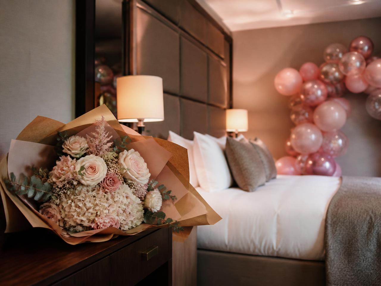 Fresh Flowers styled inside a hotel room celebration
